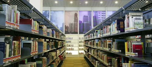 Shelves holding the National Collection titles in the Lee Kong Chian Reference Library